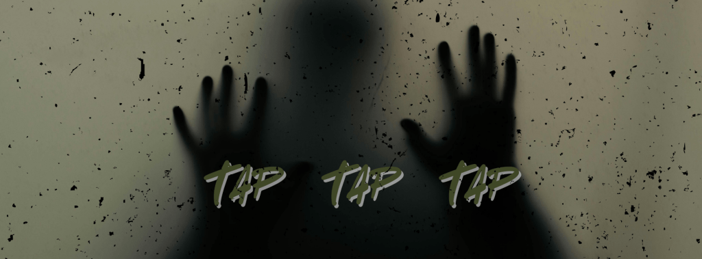 Shadow of a figure with their hands reaching out.